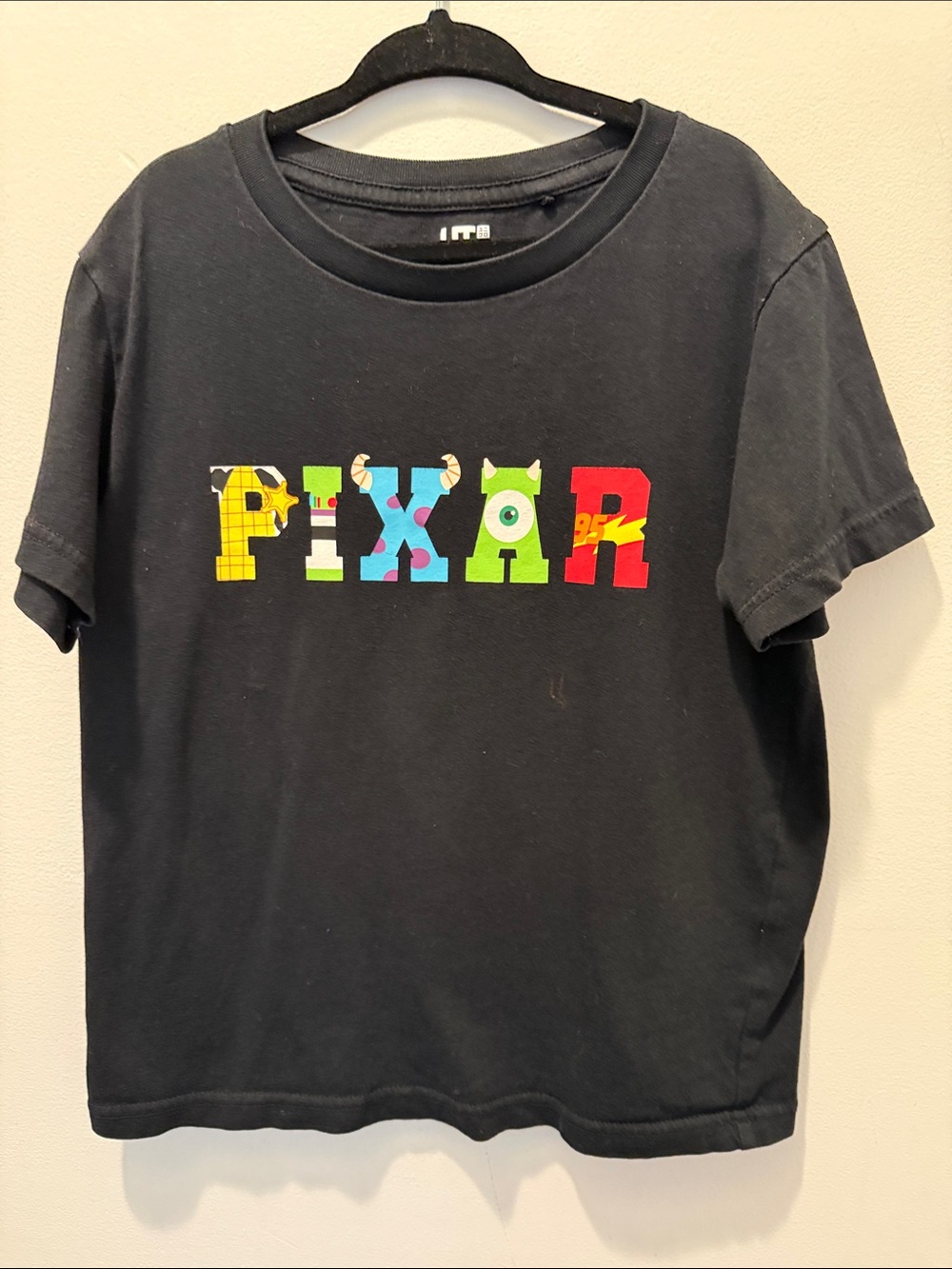 PIXAR x Uniqlo t shirt in size 5